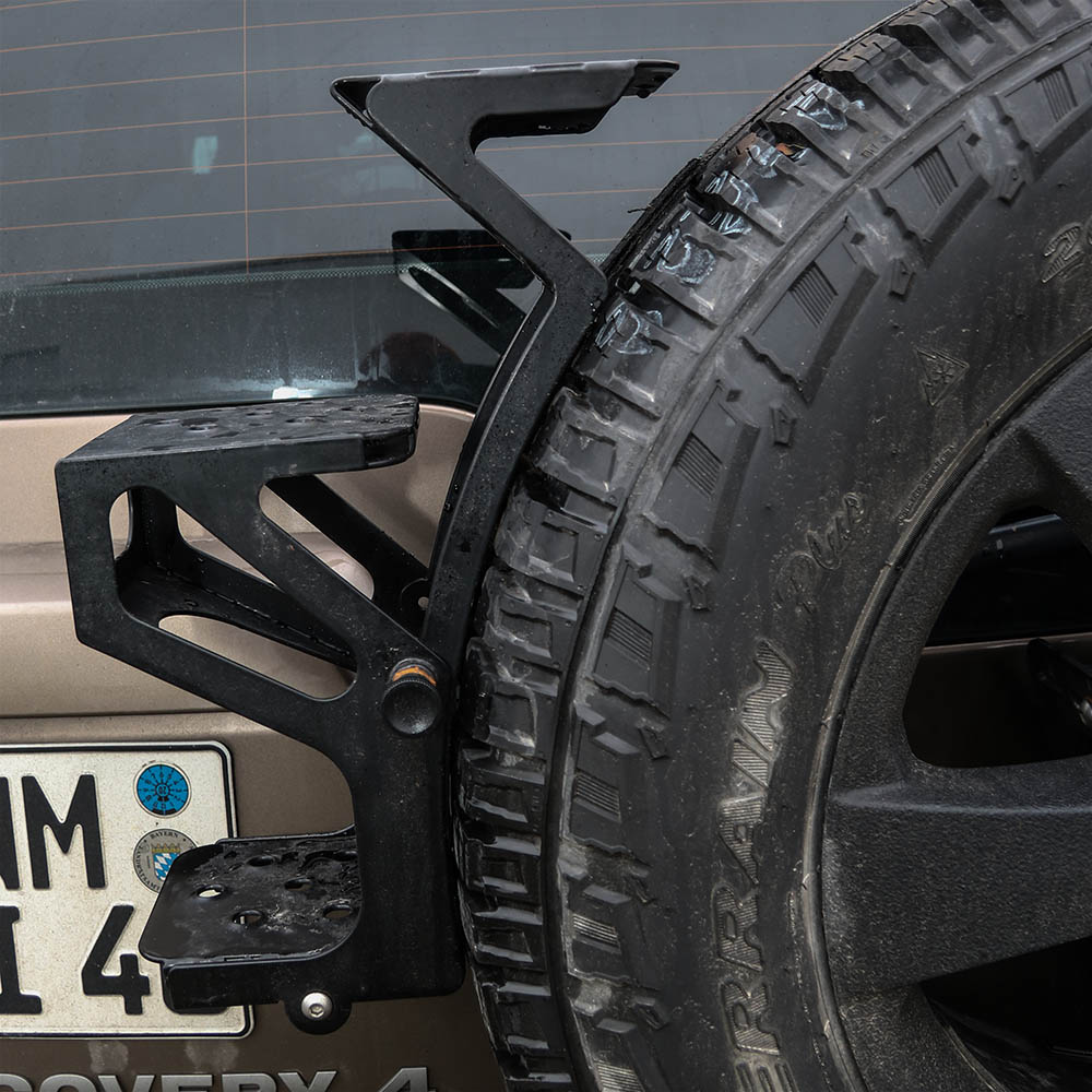 Foldable ladder, spare wheel