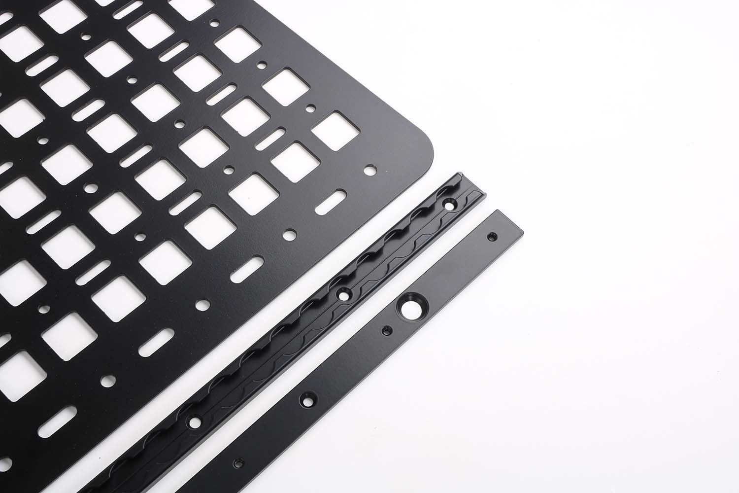 Close-up of MOLLE panel with mounting rails