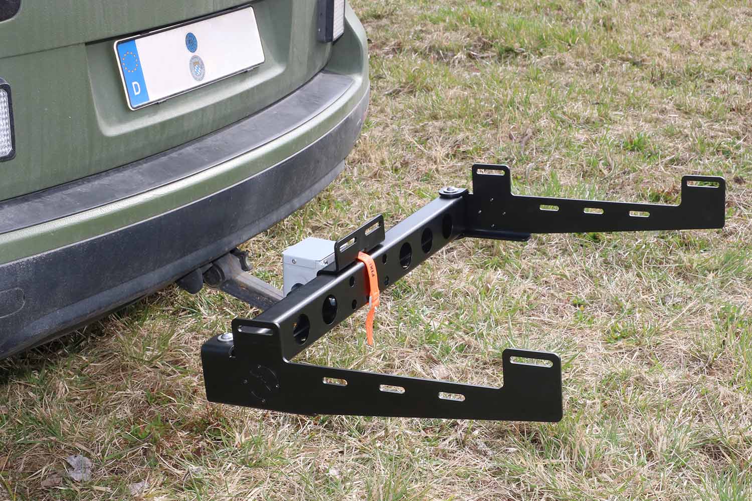 Mounting bracket for game or multi-purpose container