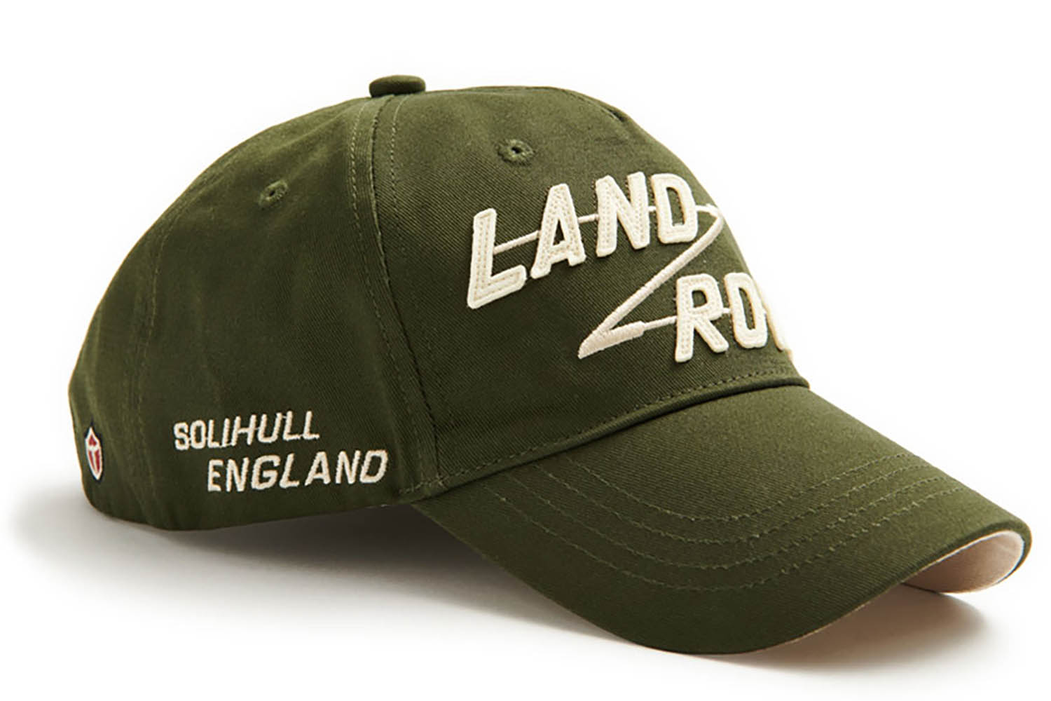 Bronze-green appliqué peaked cap, view from the right
